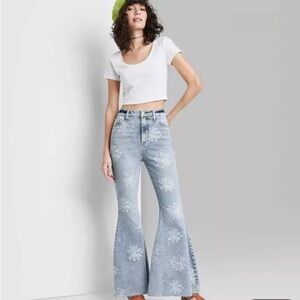 Extreme flair light wash denim with flowers